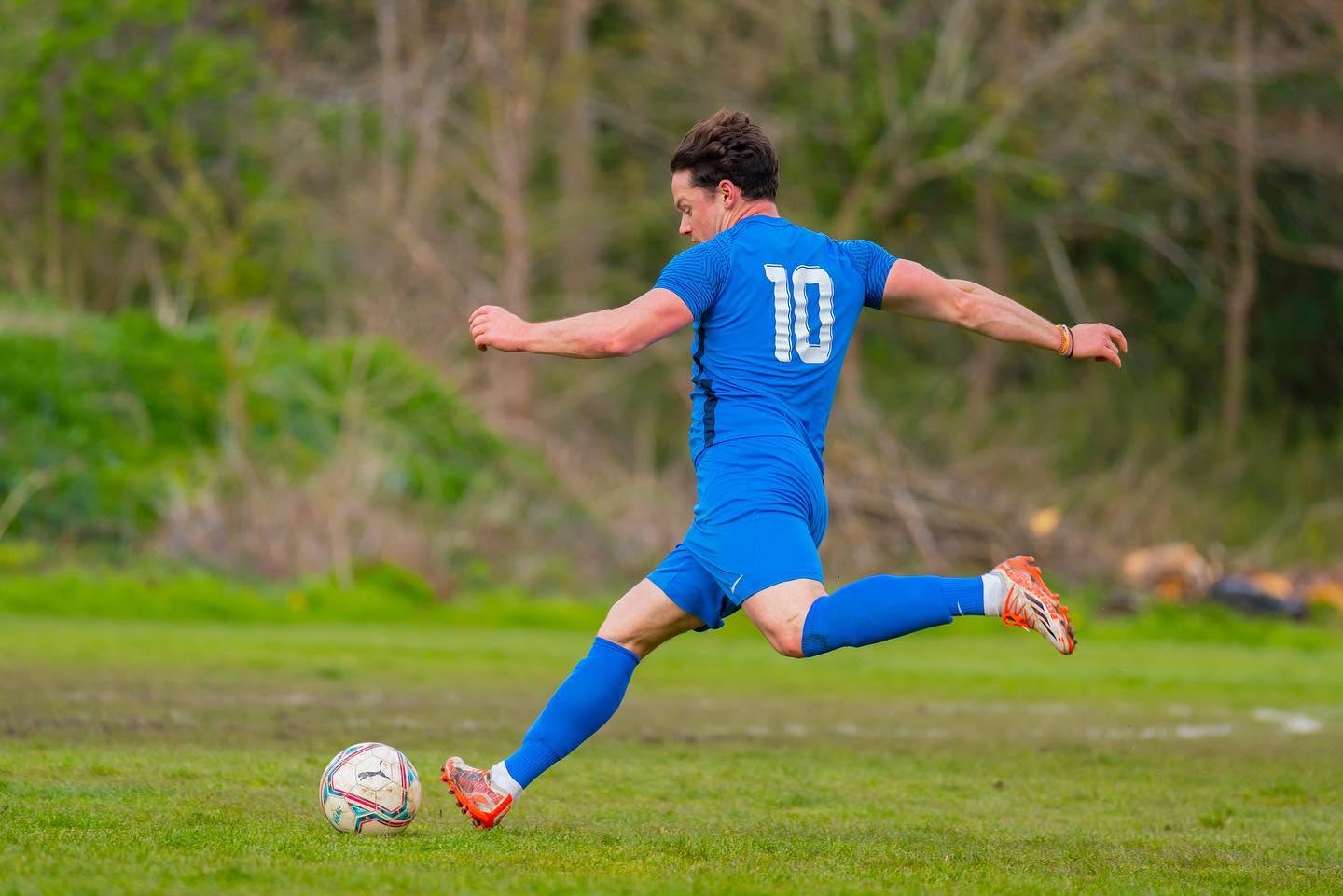 Callum Rolfe celebrating in blue kit